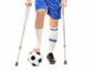 11744270-full-length-portrait-of-an-injured-soccer-football-player-on-crutches-isolated-on-white-background.jpg